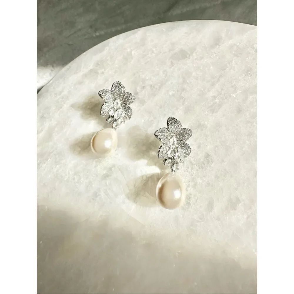 Cubic zirconia pearl orchid dangle earrings 